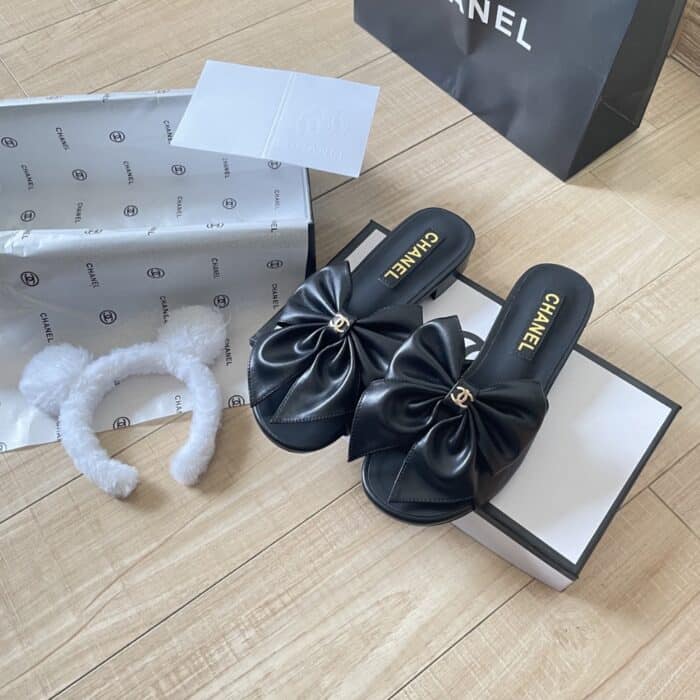 Chanel Bow Embellished Slides In Black - Image 4