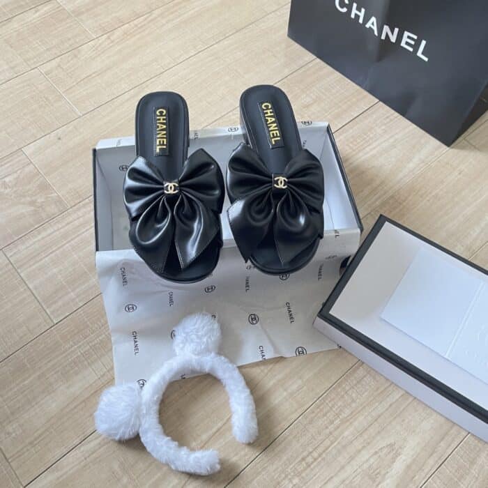 Chanel Bow Embellished Slides In Black - Image 7